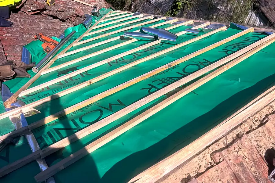 Re-sarked roof section with new battens ready for the tiles to go back on, Castle Hill