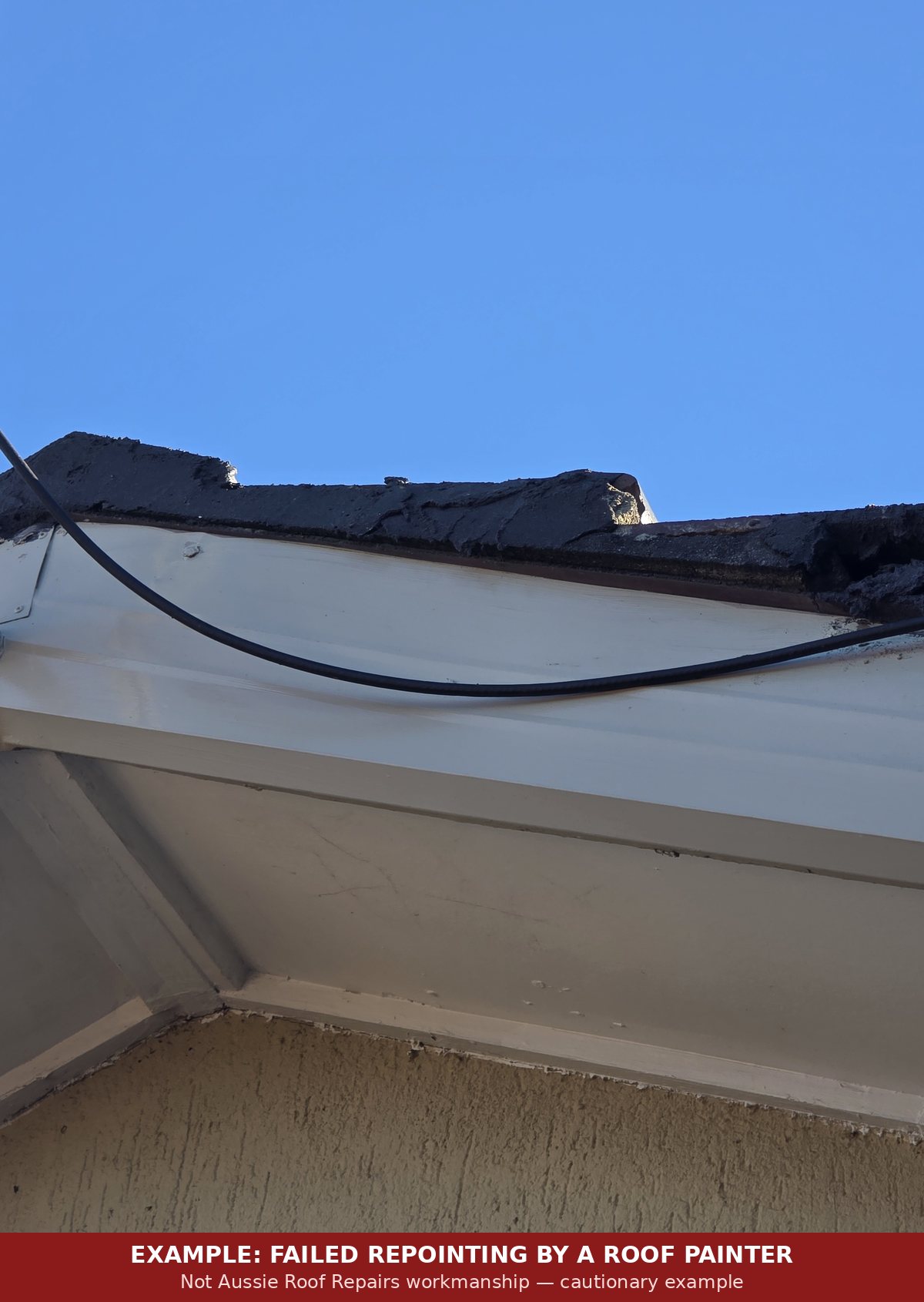 Cracked and lifting repointing over roof capping from a painter's attempt (not Aussie Roof Repairs work)